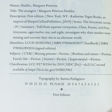 Load image into Gallery viewer, The Strangers Margaret Peterson Haddix SIGNED Book 1st Edition Greystone Secrets
